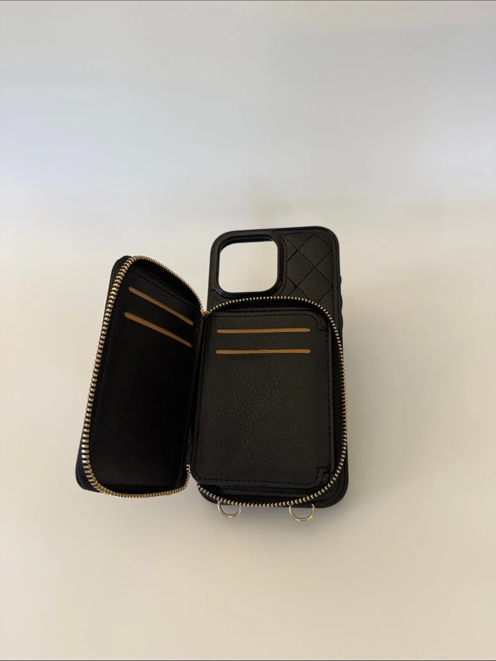 Black Quilted Wallet Phone Case with adjustable strap. iPhone 16 ProMax